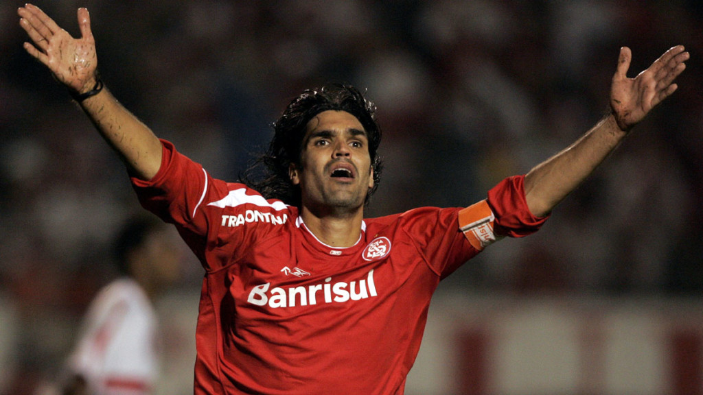 **FILE** In this Aug.16, 2006 file photo, Fernandao of Internacional celebrates after scoring against  Sao Paulo FC at the Beira Rio Stadium in Porto Alegre, Brazil. The Brazilian football team Internacional says former striker and coach Fernando Lucio da Costa, better known as Fernandao, has died in a helicopter crash.The team says on its website that the 36-year old Fernandao was one of five passengers killed when the helicopter crashed early Saturday in the state of Goias, where he had a house.(AP Photo/Silvia Izquierdo-FILE)